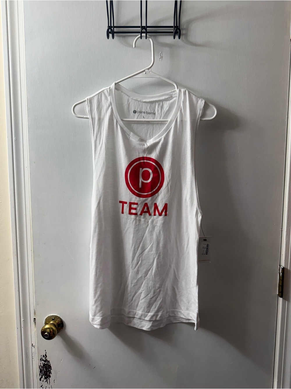Pure Barre White Tank with Red 'TEAM' Logo